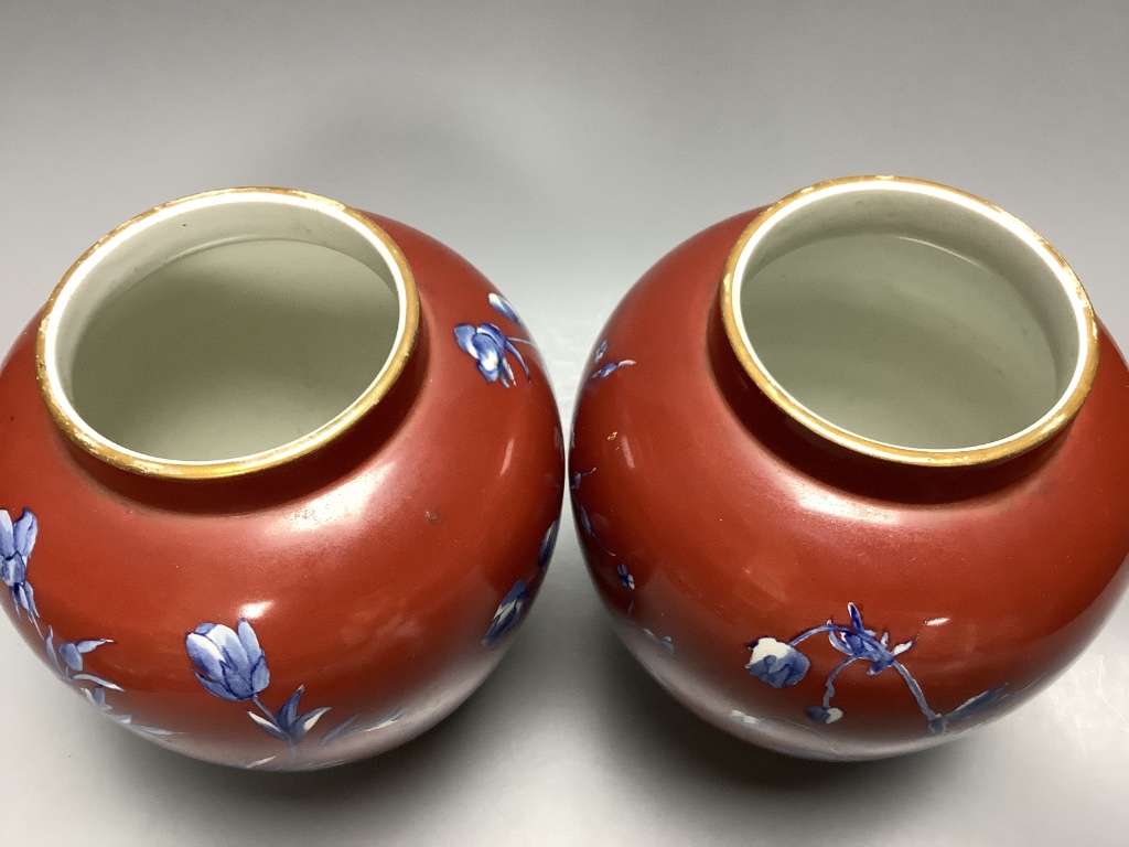 A pair of Victorian Wedgwood vases and covers 25cm